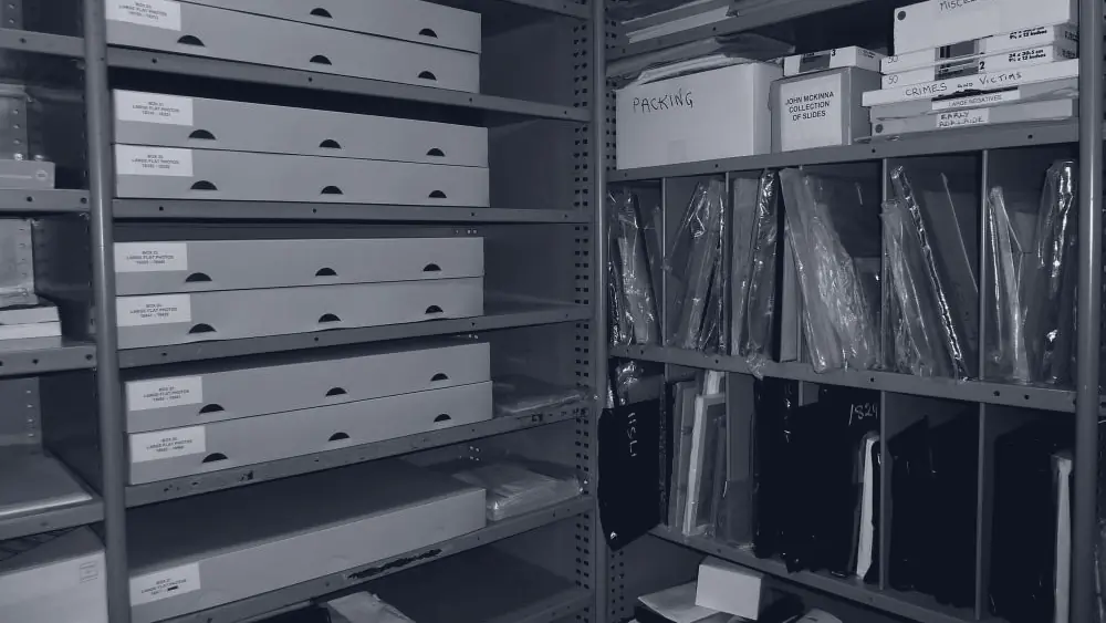 Archive shelving stacked with document boxes